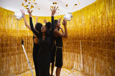 Birthday party guests using the 360 photo booth